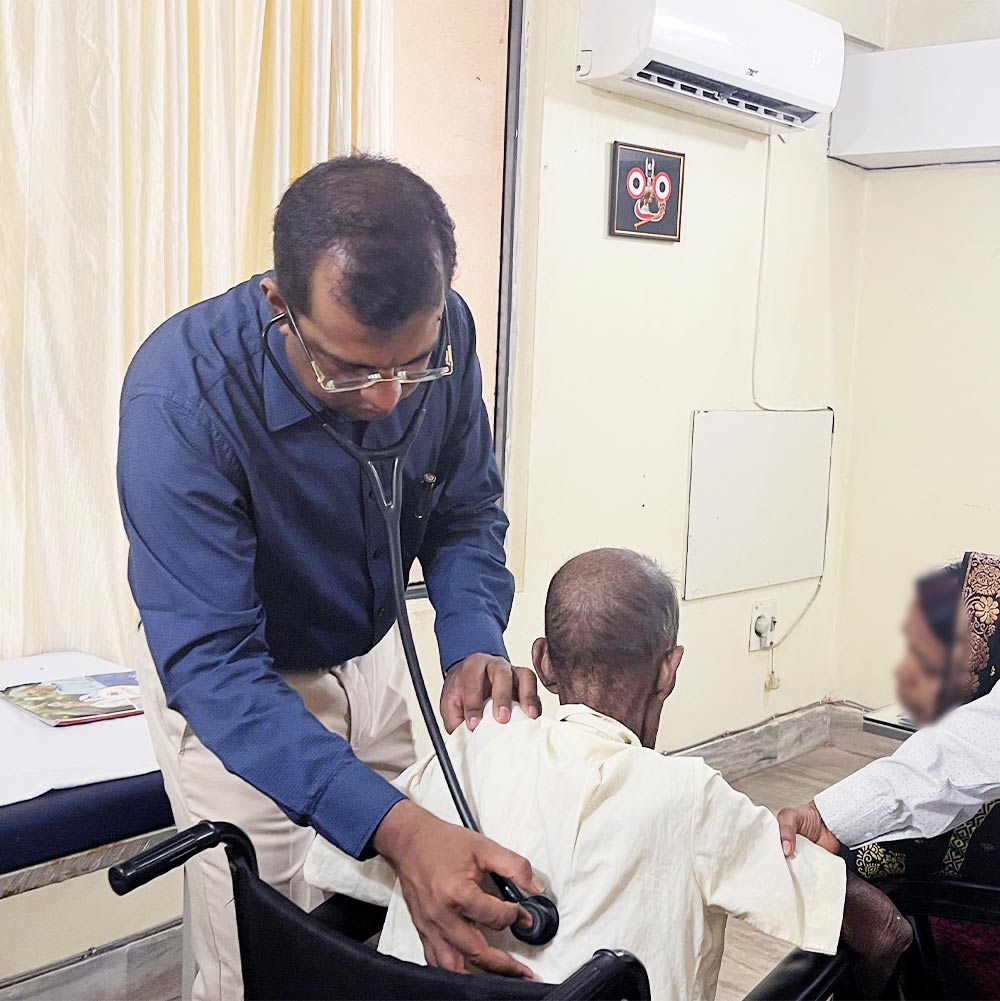 Dr. Sampat Dash checking upon the patient at OPD